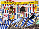 A man amongst deck chairs, Weymouth photographed by artist Trevor Heath